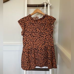 Leopard print top with peplum hem and ruffle collar